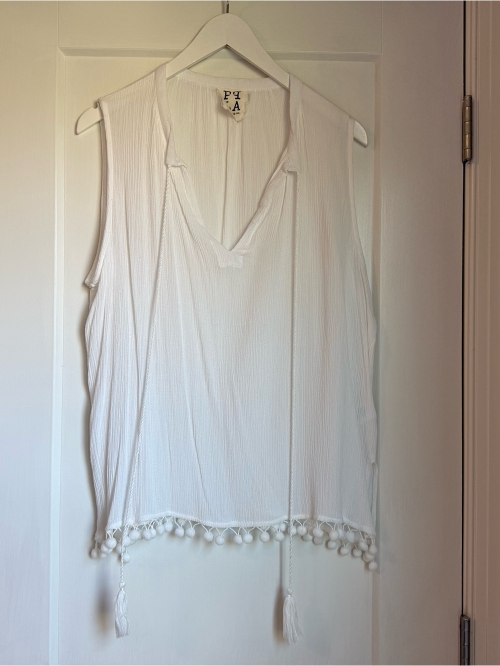 PPLA White Sleeveless V-Neck Camisole with Pom-Pom Hem